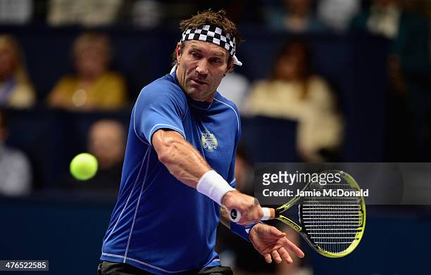 Pat Cash in action during his match against Ivan Lendl during the World Tennis Day London Showdown press conference at the Athenaeum Hotel at...