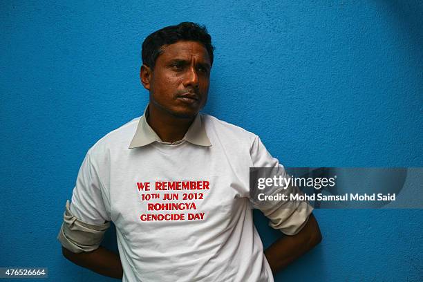 Muslim Rohingya living in Malaysia listen a conference during a day of commemoration to remember the 2012 Rohingya genocide on June 10, 2015 in...