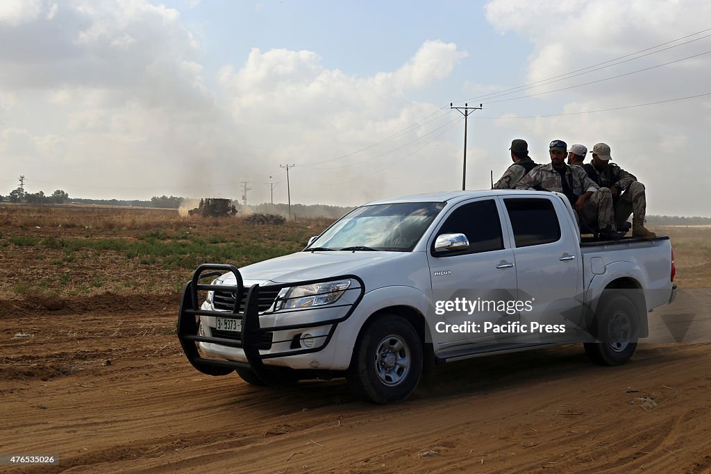 Palestinian militants of the Ezzedine al-Qassam Brigades,...