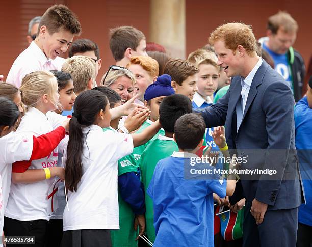 Prince Harry meets local school children as he attends the launch of the Rugby World Cup Trophy Tour, 100 days before the Rugby World Cup at...