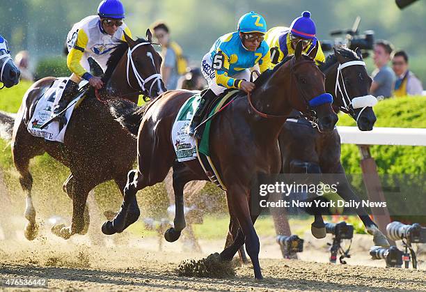 Victor Espinoza riding American Pharoah wins the 147th running of the Belmont Stakes Saturday, June 6, 2015 at Belmont Racetrack in Elmont, NY....