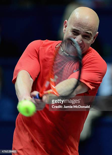 Andre Agassi in action during his match against Pete Sampras during the World Tennis Day London Showdown press conference at the Athenaeum Hotel at...