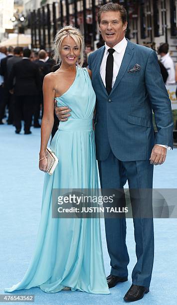 Actor David Hasselhoff and his Welsh girlfriend Hayley Roberts pose for photographers as they arrive to attend the European Premiere of "Entourage"...
