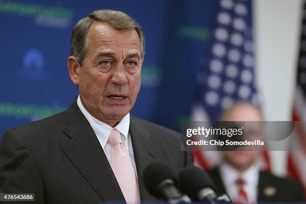 Speaker of the House John Boehner answers reporters' questions during a news conference following the weekly House GOP conference meeting at the U.S....