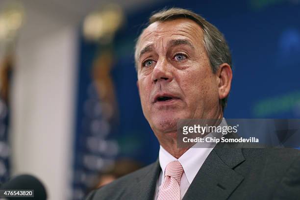 Speaker of the House John Boehner answers reporters' questions during a news conference following the weekly House GOP conference meeting at the U.S....