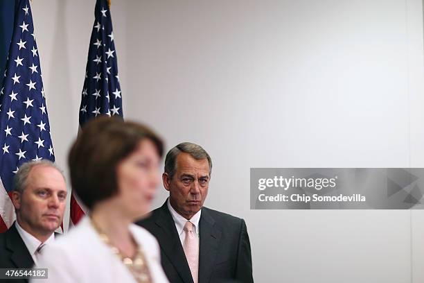 Speaker of the House John Boehner and House Majority Whip Steve Scalise listen to Rep. Cathy McMorris Rogers during a news conference following the...