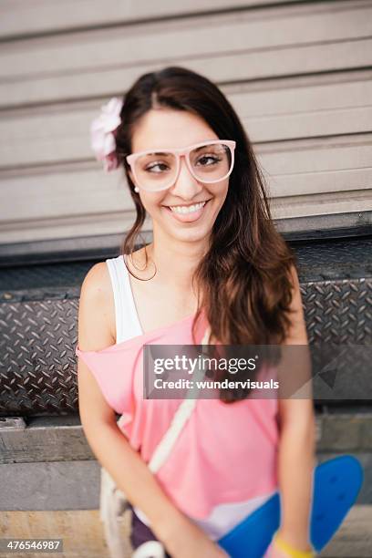girl with skateboard making a face - cross eyed stock pictures, royalty-free photos & images