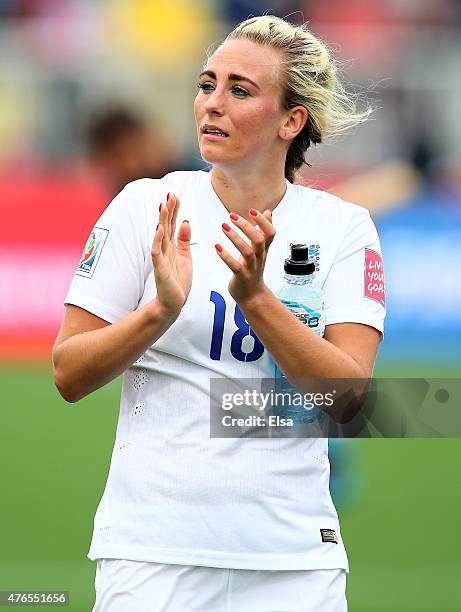 Toni Duggan of England salutes the fans after the match against France during the FIFA Women's World Cup 2015 Group F match at Moncton Stadium on...