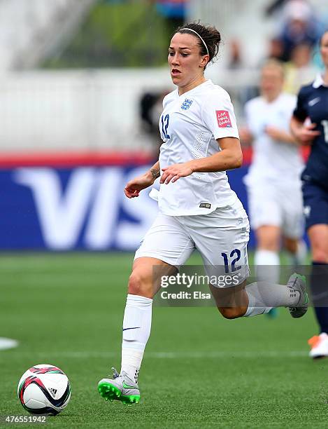 Lucy Bronze of England takes the ball in the first half against France during the FIFA Women's World Cup 2015 Group F match at Moncton Stadium on...