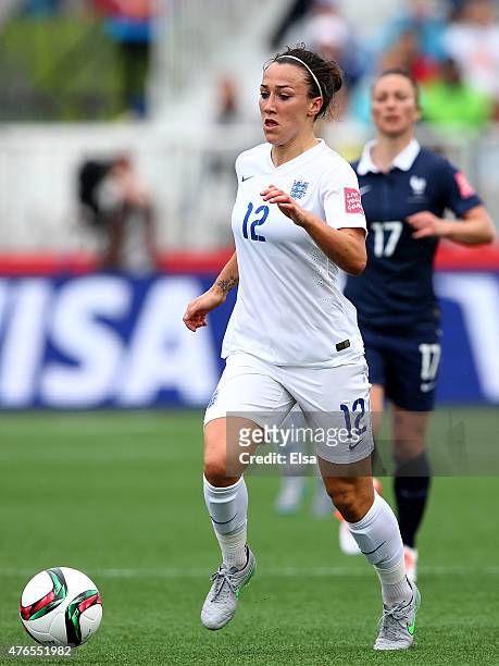 Lucy Bronze of England takes the ball in the first half against France during the FIFA Women's World Cup 2015 Group F match at Moncton Stadium on...