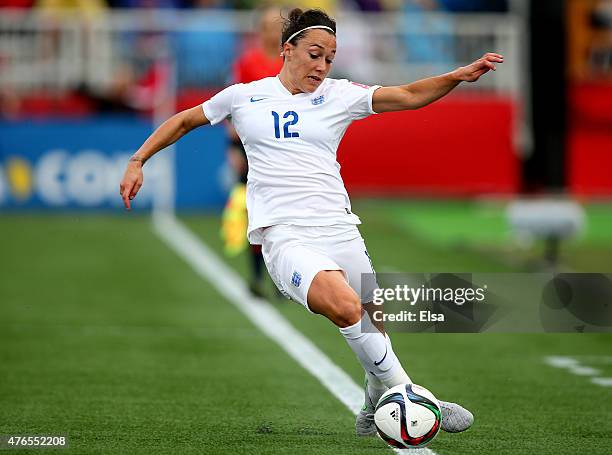 Lucy Bronze of England tries to keep the ball in play in the first half against France during the FIFA Women's World Cup 2015 Group F match at...