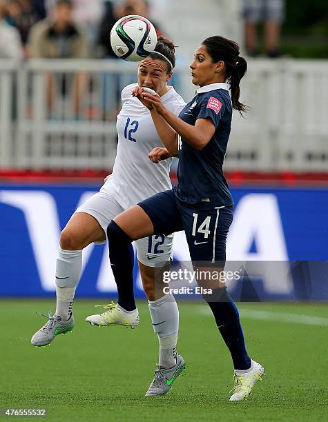 Lucy Bronze of England and Louisa Necib of France fight for the ball in the second half during the FIFA Women's World Cup 2015 Group F match at...