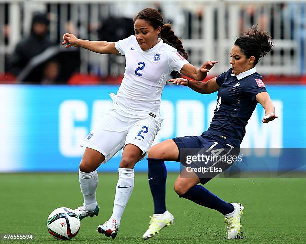 Alex Scott of England controls the ball as Louisa Necib of France tries to knock it away during the FIFA Women's World Cup 2015 Group F match at...