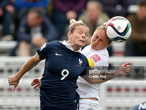 Eugenie Le of France and Steph Houghton of England fight for the ball during the FIFA Women's World Cup 2015 Group F match at Moncton Stadium on June...