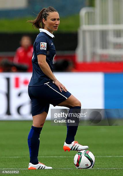 Gaetane Thiney of France takes the ball to start the match against England during the FIFA Women's World Cup 2015 Group F match at Moncton Stadium on...