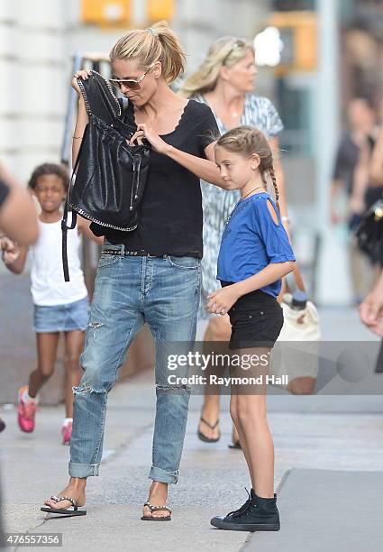 Model Heidi Klum,Henry Gunther Ademola Dashtu Samuel,Helene Boshoven Samuel are seen in Tribeca on June 9, 2015 in New York City.