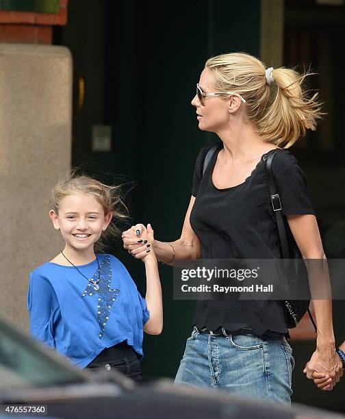 Model Heidi Klum,Henry Gunther Ademola Dashtu Samuel,Helene Boshoven Samuel are seen in Tribeca on June 9, 2015 in New York City.