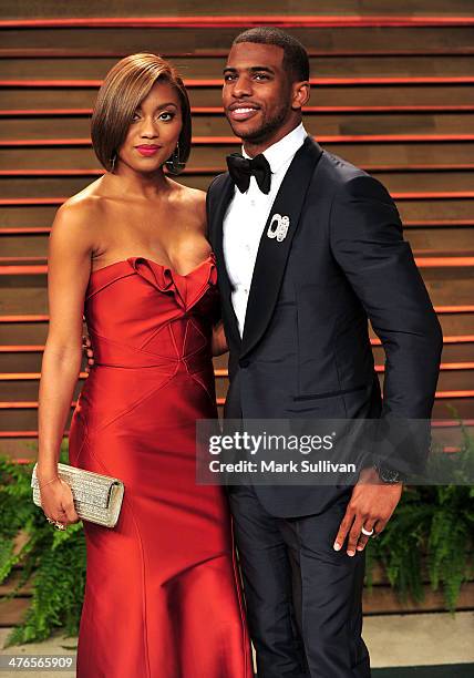 Player Chris Paul and wife Jada Crawley attend the 2014 Vanity Fair Oscar Party hosted by Graydon Carter on March 2, 2014 in West Hollywood,...