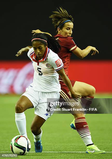 Sonia Bermudez of Spain is challenged by Diana Saenz of Costa Rica during the FIFA Women's World Cup 2015 group E match between Spain and Costa Rica...