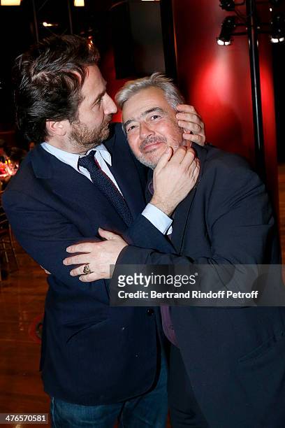 Edouard Baer and artist Herve Di Rosa attend the Martine Aublet Foundation gala dinner at the Musee Du Quai Branly on March 3, 2014 in Paris, France.