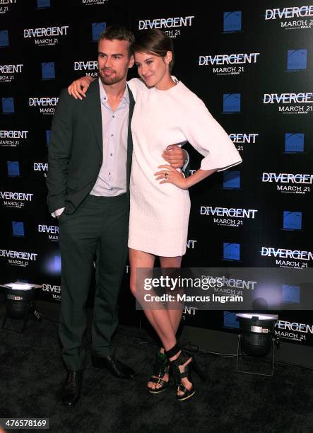 Theo James & Shailene Woodley attends the "Divergent" screening at Regal Atlantic Station on March 3, 2014 in Atlanta, Georgia.