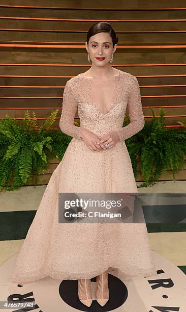 Actress Emmy Rossum arrives at the 2014 Vanity Fair Oscar Party Hosted By Graydon Carter on March 2, 2014 in West Hollywood, California.