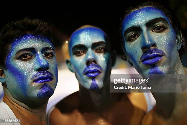 Members pose before the start of the Portela samba school parade at 2014 Brazilian Carnival at Sapucai Sambadrome on March 03, 2014 in Rio de...