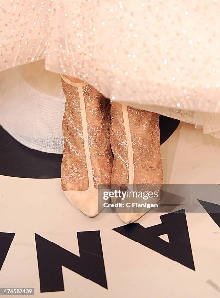 Actress Emmy Rossum arrives at the 2014 Vanity Fair Oscar Party Hosted By Graydon Carter on March 2, 2014 in West Hollywood, California.