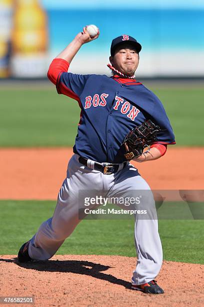Junichi Tazawa of the Boston Red Sox pitches during the spring training game against the Pittsburgh Pirates at McKechnie Field on March 3, 2014 in...