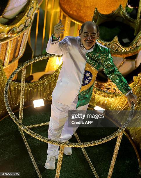 Former Brazilian football player Rivelino performs with the Imperatriz samba school during the second night of carnival parade at the Sambadrome in...
