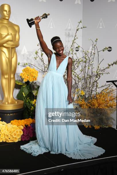 Actress Lupita Nyong'o poses in the press room at the 86th Annual Academy Awards at Hollywood & Highland Center on March 2, 2014 in Los Angeles,...