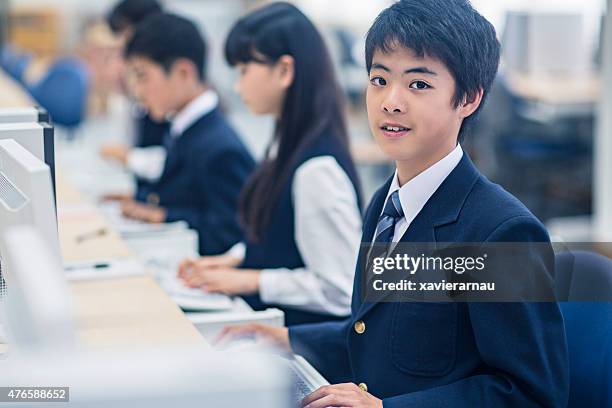 japanese boy in the computer class - japanese school uniform stock pictures, royalty-free photos & images