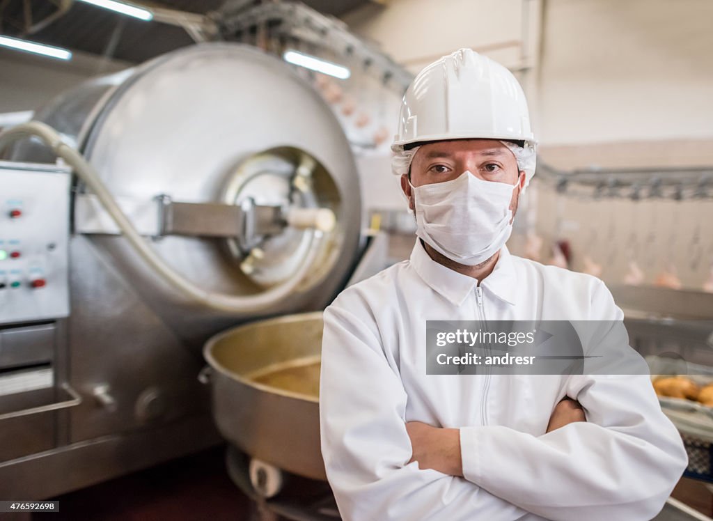 Man working at a food factory