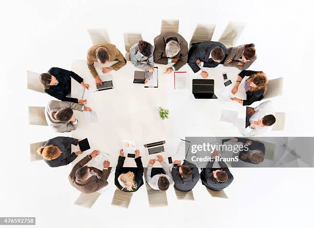 high angle view of large group of business people working. - large group of people at work stock pictures, royalty-free photos & images