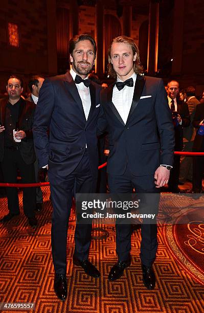 Henrik Lundqvist and Carl Hagelin attends the 2014 New York Rangers Casino Night To Benefit The Garden Of Dreams Foundation at Gotham Hall on March...