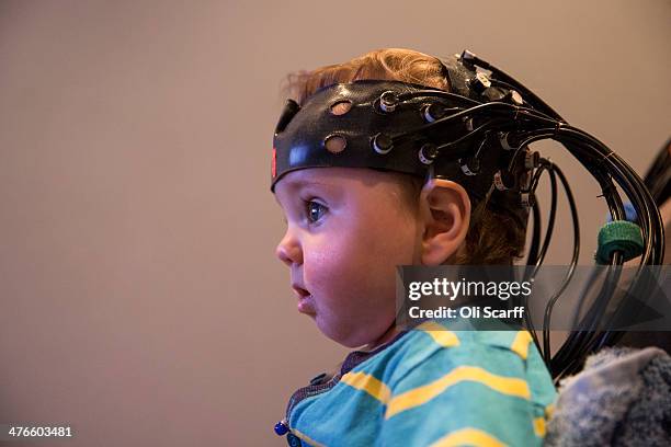 Leo, aged 9 months, takes part in an experiment at the 'Birkbeck Babylab' Centre for Brain and Cognitive Development, on March 3, 2014 in London,...
