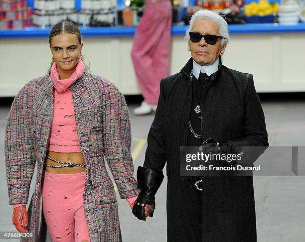 Fashion Designer Karl Lagerfeld and model Cara Delevingne appear at the end of the runway during the Chanel show as part of the Paris Fashion Week...