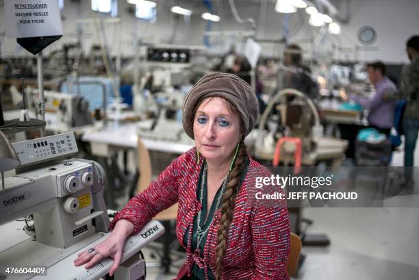 Founder and CEO, Muriel Pernin poses on March 4, 2014 at "les Atelieres" lingerie plant in Villeurbanne, center France. Les Atelieres, an association...