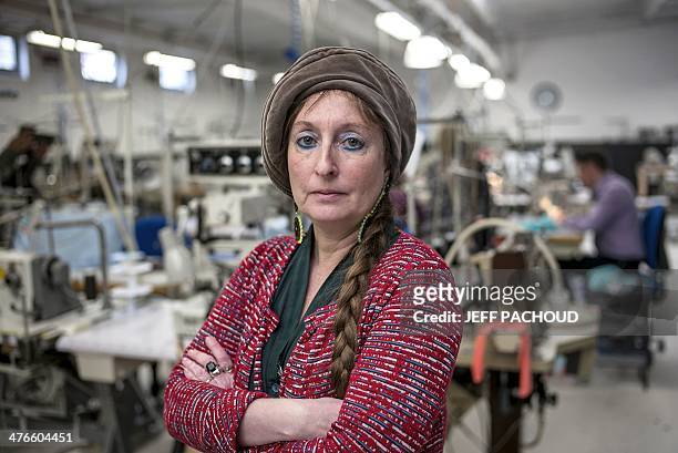 Founder and CEO, Muriel Pernin poses on March 4, 2014 at "les Atelieres" lingerie plant in Villeurbanne, center France. Les Atelieres, an association...