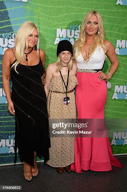 Linda Hogan, Allyson Chernenko and Brooke Hogan attend the 2015 CMT Music awards at the Bridgestone Arena on June 10, 2015 in Nashville, Tennessee.