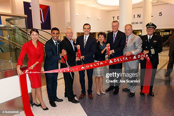 Between flight attendant and pilot) Delta Vice President - Sales, West Ranjan Goswami, City of Los Angeles Councilmember Mike Bonin, City of Los...