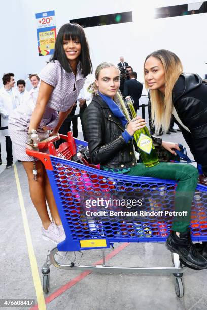 Singer Rihanna, model Cara Delevingne and a model have fun after the Chanel show as part of the Paris Fashion Week Womenswear Fall/Winter 2014-2015...