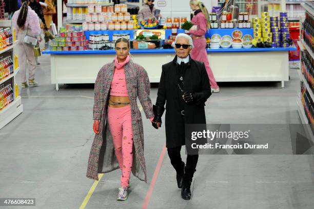 Fashion Designer Karl Lagerfeld and model Cara Delevingne appear at the end of the runway during the Chanel show as part of the Paris Fashion Week...