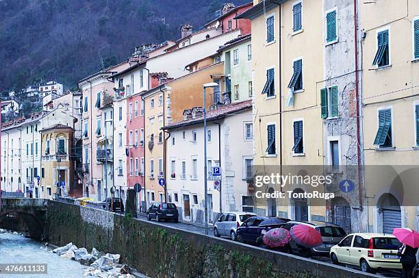 colourful via carriona in carrara under the rain - ruga stock pictures, royalty-free photos & images