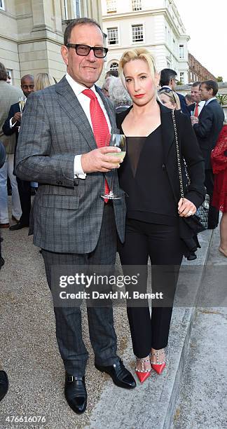 Richard Desmond and Joy Desmond attend the Bell Pottinger Summer Party at Lancaster House on June 10, 2015 in London, England.