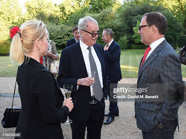 Joy Desmond; Tim Bell and Richard Desmond attend the Bell Pottinger Summer Party at Lancaster House on June 10, 2015 in London, England.