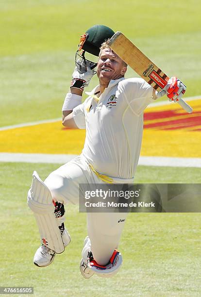 David Warner of Australia celebrates after reaching 100 runs during day 4 of the third test match between South Africa and Australia at Sahara Park...