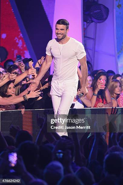 Sam Hunt performs onstage during the 2015 CMT Music awards at the Bridgestone Arena on June 10, 2015 in Nashville, Tennessee.