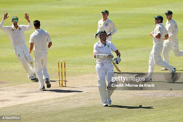 Graeme Smith of South Africa leaves the field after getting out to Mitchell Johnson of Australia during day 4 of the third test match between South...