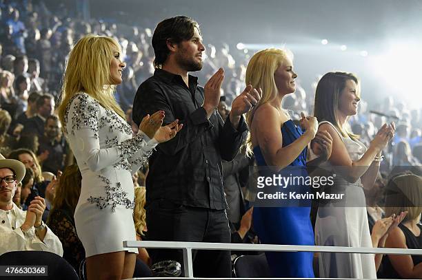 Singer Carrie Underwood and her husband Mike Fisher attend the 2015 CMT Music awards at the Bridgestone Arena on June 10, 2015 in Nashville,...